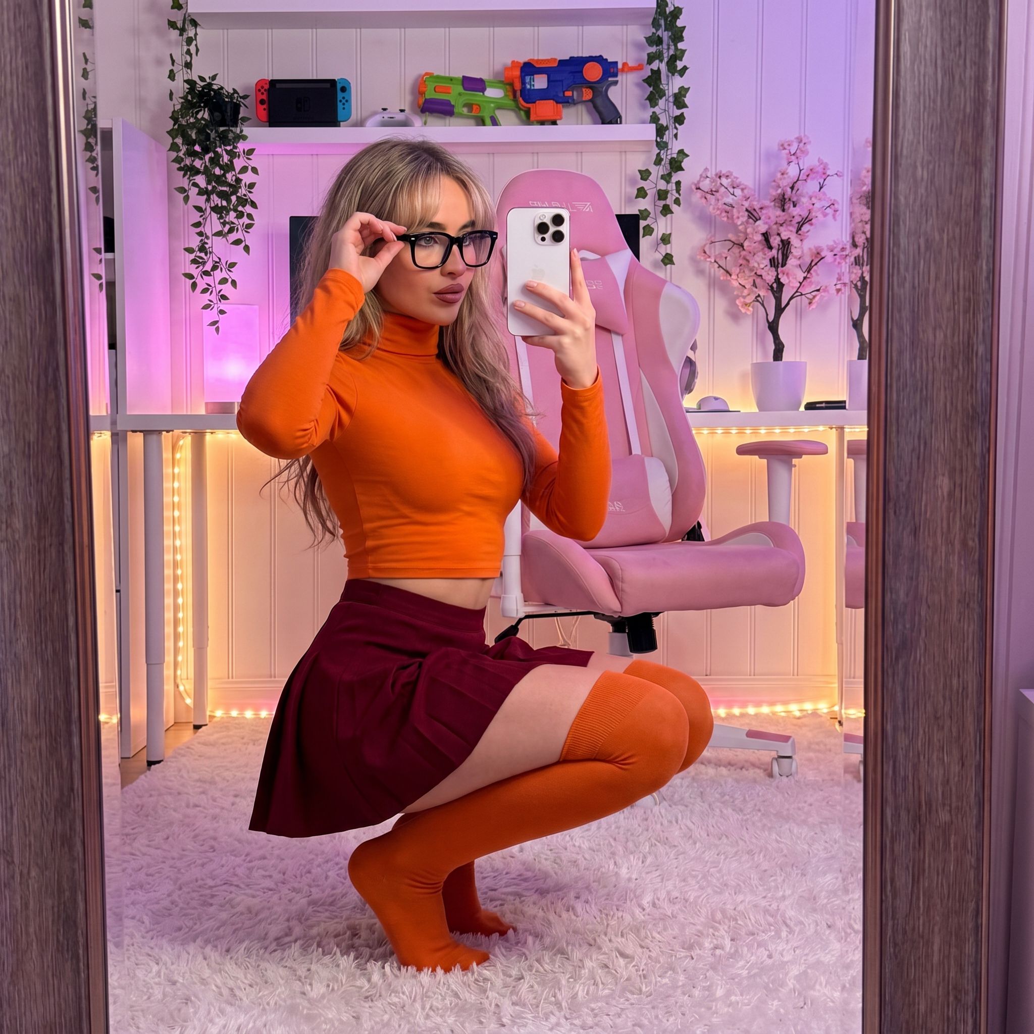 Ultra-Photorealistic Sabrina Carpenter Mirror Selfie in Gaming Room